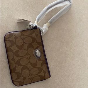 **brand new** Coach wristlet